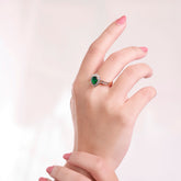 Emerald Shine 18K gold-plated ring with a bold centerpiece and delicate accents
